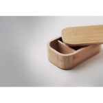 Lunchbox aus Bambus mit herausnehmbarer Trennwand und elastischem Nylonband. Darf nur Trockenfutter enthalten. Fassungsvermögen: 650 ml.-Holz-8719941055179-6