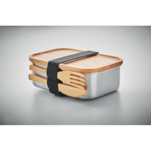Lunchbox aus Edelstahl mit Bambusdeckel und 2 Besteckteilen. Elastisches Band aus Polyester. Fassungsvermögen 600ml. Bambus ist ein Naturprodukt