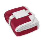 200 g/m² Fleecedecke mit 220 g/m² Polyester-Sherpa-Futter. Eingewickelt in Band und bedruckbarer Karte.-Bordeaux-8719941011861