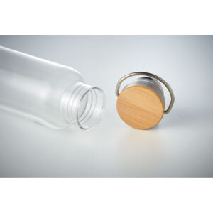 Bouteille Tritan¢ sans BPA 800 ml avec fond en acier inoxydable et couvercle avec détail en bambou. Le bambou est un produit naturel