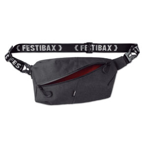 Festibax® Basic. Polyester teint cationique 300D 2 tons avec zip imperméable et lanière amovible et réglable. Comprend un compartiment antivol à  l'avant et à  l'arrière. Le sac Festival-Noir-8719941048546-1