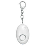 Mini alarme personnelle en ABS qui  s'active en tirant la goupille attachée au porte-clés. Comprend une lumière blanche LED. 3 piles AG13 incluses.-Blanc-8719941007321-1